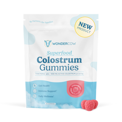 Package of WonderCow Superfood Colostrum Gummies with a strawberry flavor label on a white background